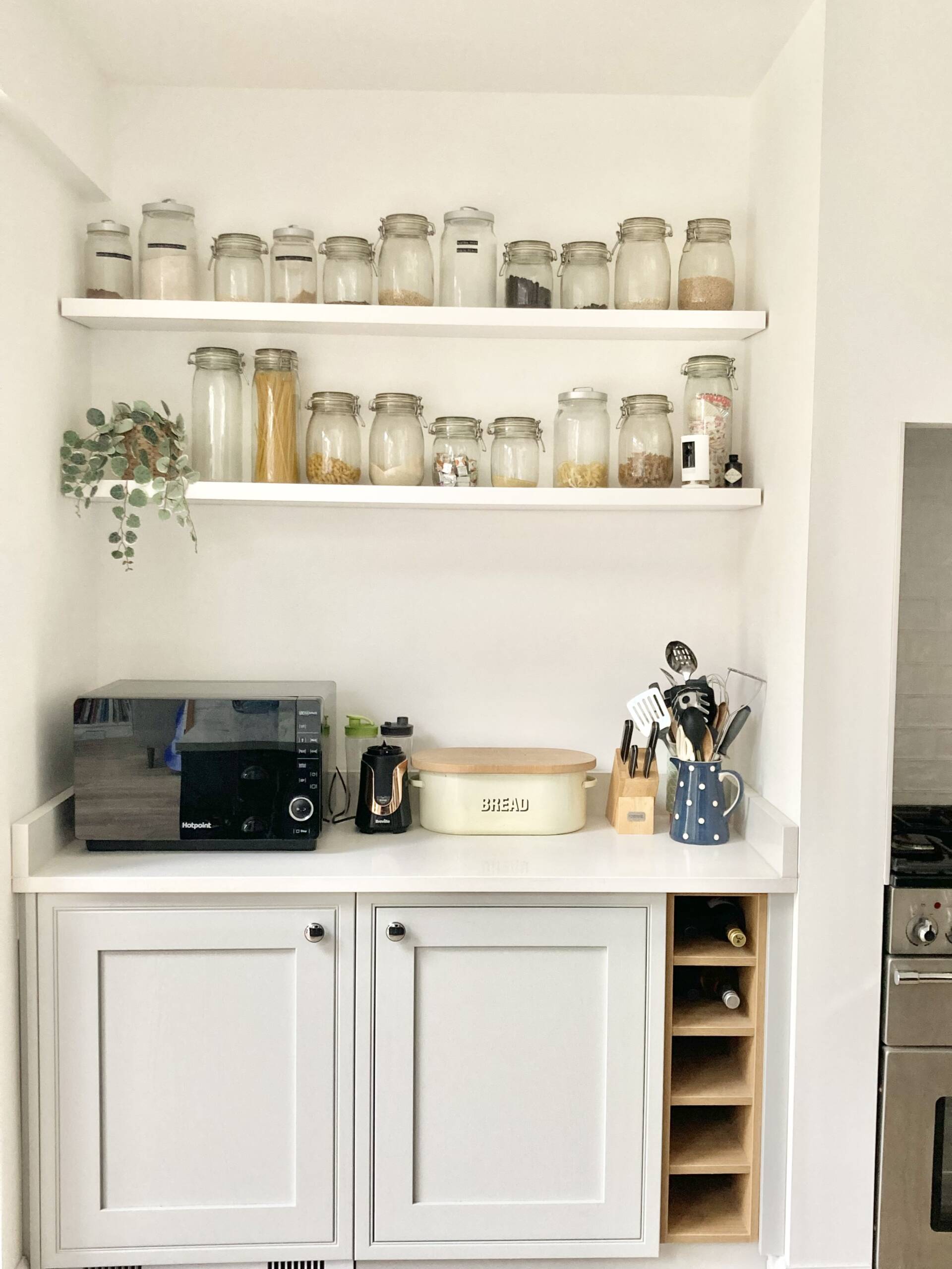open shelving in kitchen with jars